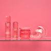 pack Juicy Flor de Mayo con bruma corporal aceite seco exfoliante y loción corporal