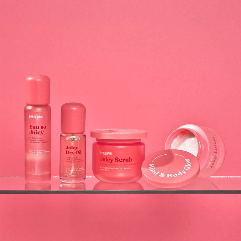 pack Juicy Flor de Mayo con bruma corporal aceite seco exfoliante y loción corporal