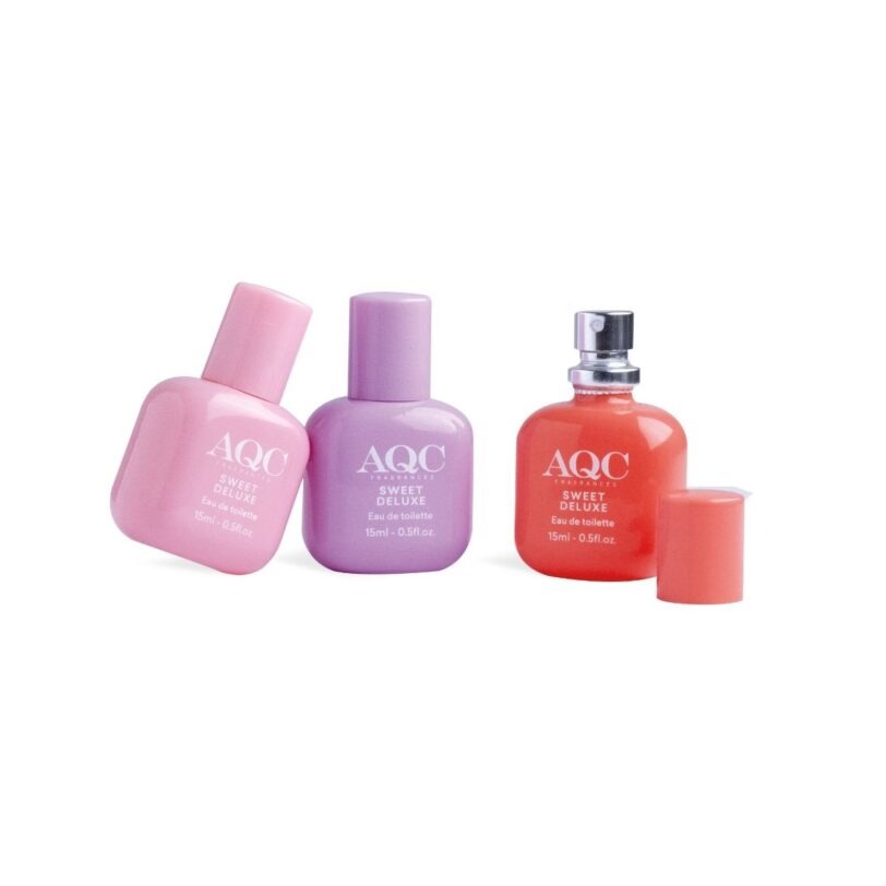 Tres perfumes AQC Sweet Luxe en frascos de 15 ml con diseños en rosa, coral y lila.