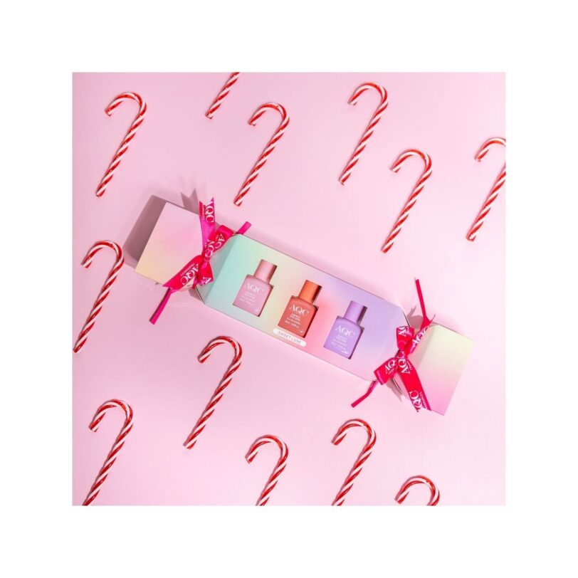 AQC Sweet Luxe con tres perfumes de 15 ml en una caja decorativa con lazos rosas.