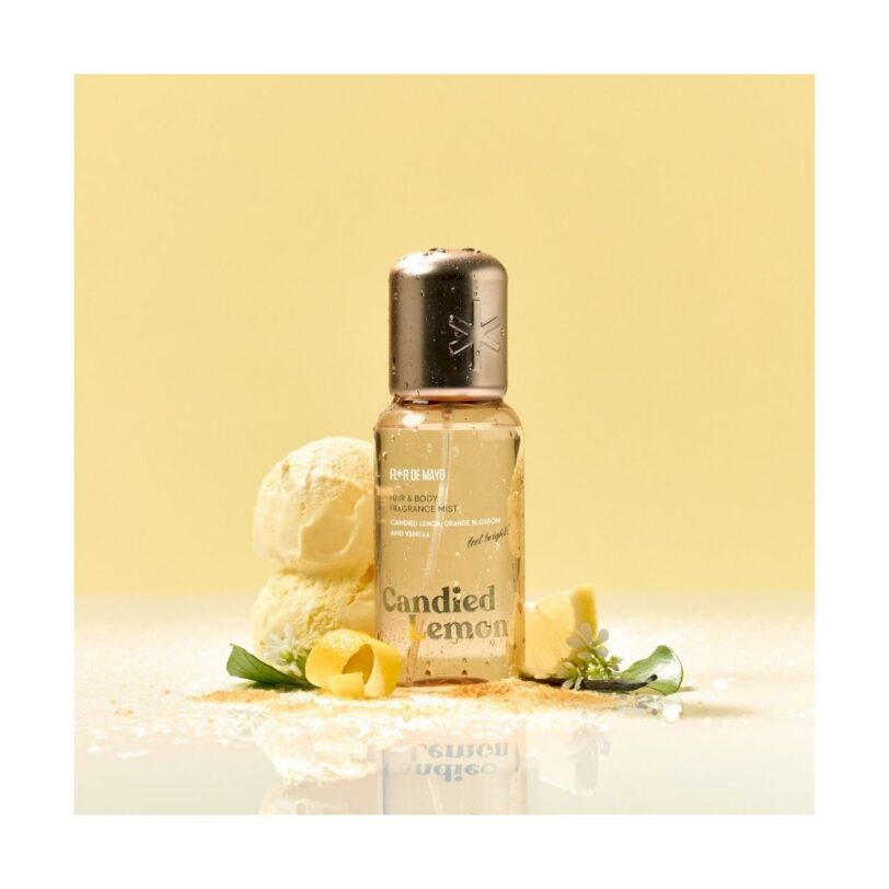 Hair & Body Fragrance Mist Candied Lemon de Flor de Mayo con botella dorada y ambientación de limón y vainilla